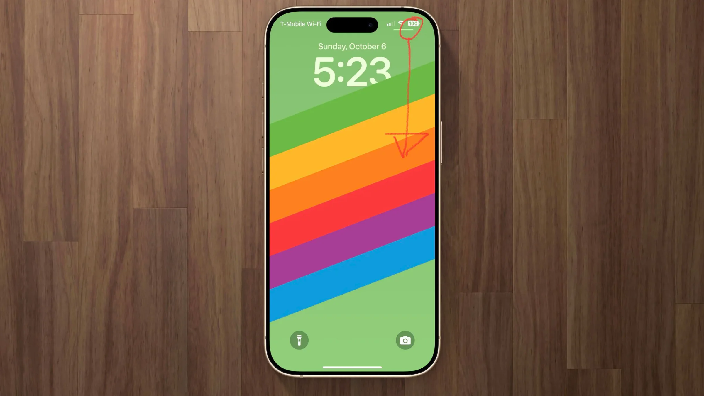 iPhone lock screen with an arrow showing the swipe gesture for Control Center