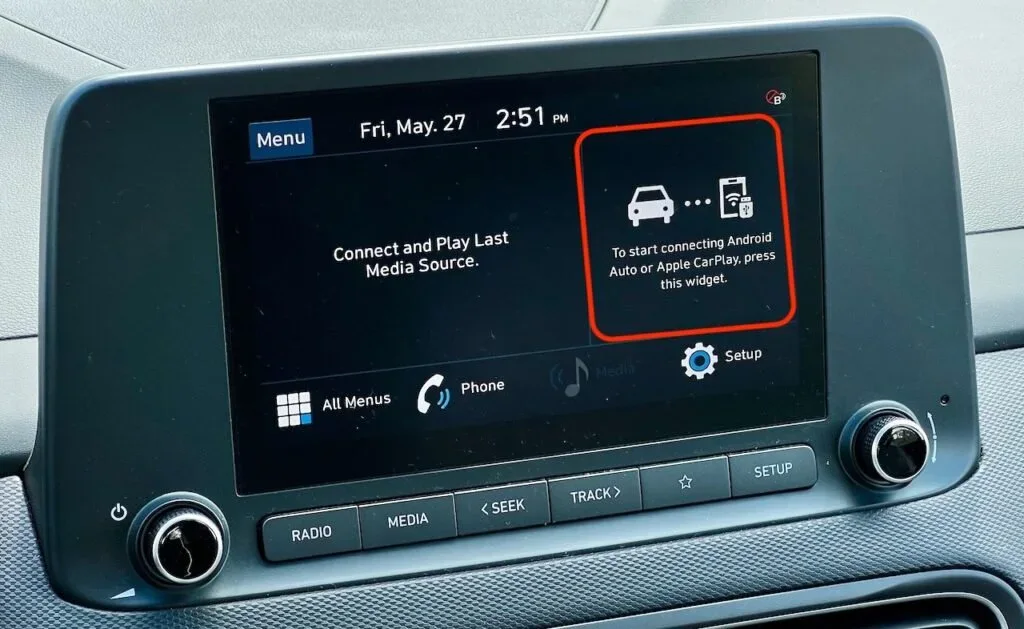 Car infotainment screen displaying a Bluetooth pairing code
