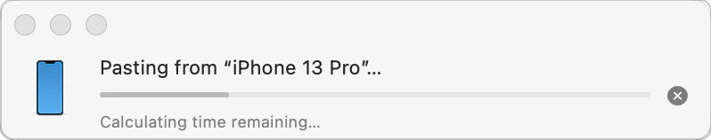 Mac progress window showing content pasting from an iPhone