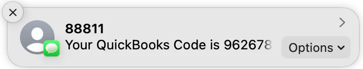 An iPhone notification containing a sample QuickBooks verification code