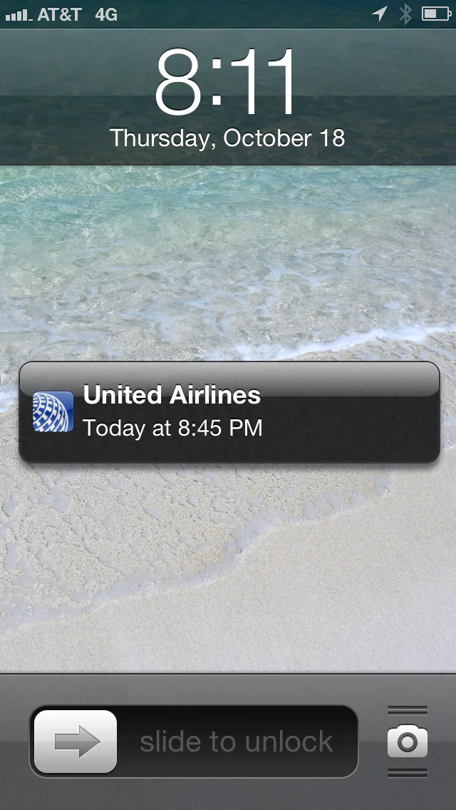 IMG_0645 iPhone lock screen notification for an upcoming United Airlines flight
