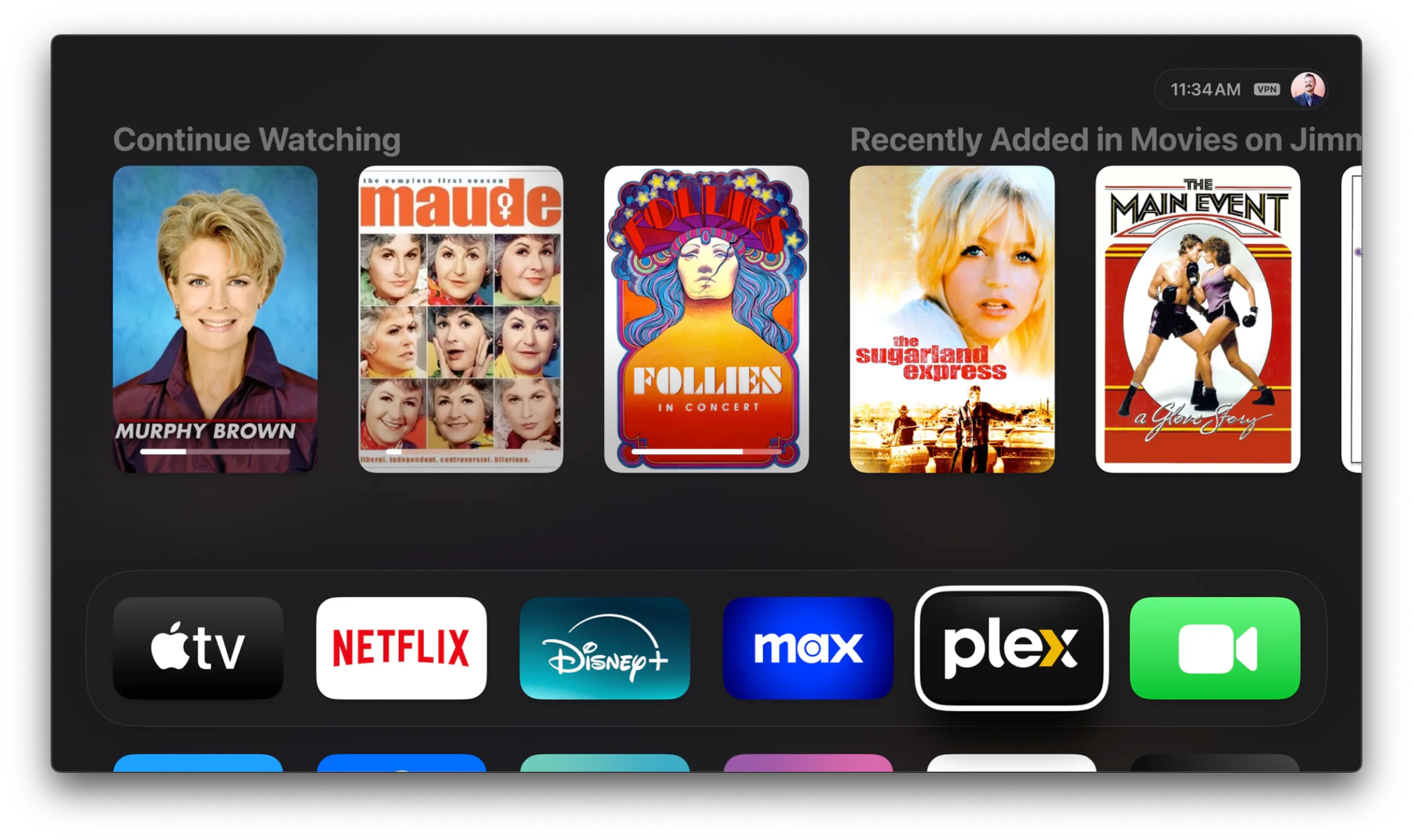 Apple TV home screen showing Continue Watching and recently added movies