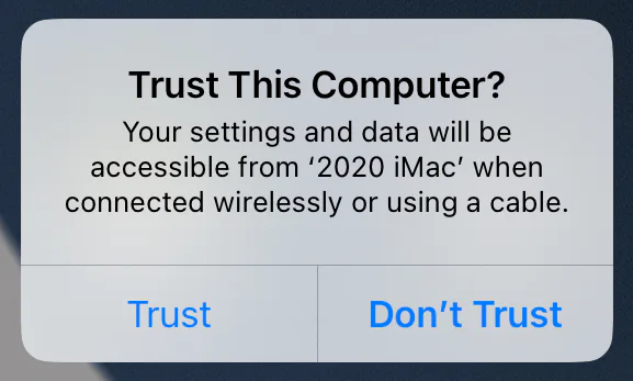 iPhone prompt asking whether to trust a newly connected computer