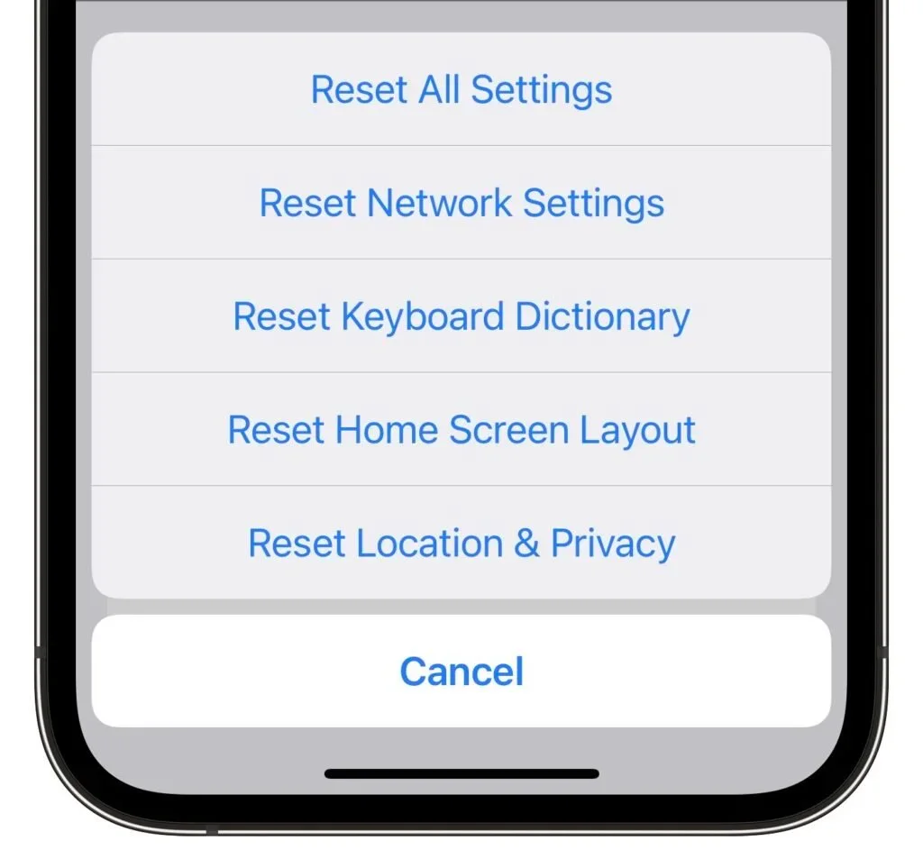 iPhone Reset menu with Reset Network Settings listed