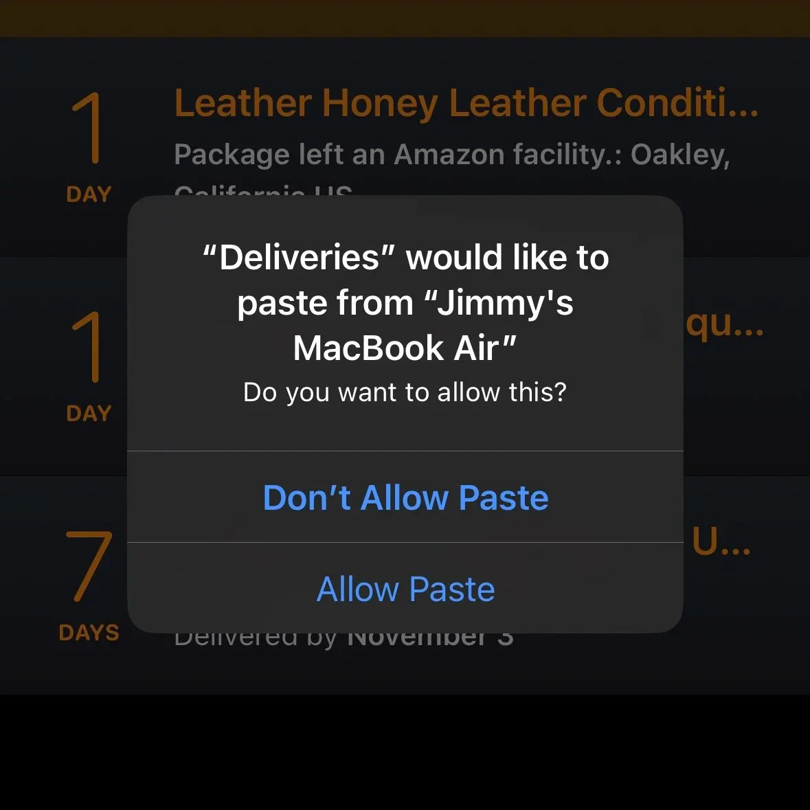 iPhone prompt asking whether an app may paste from MacBook Air