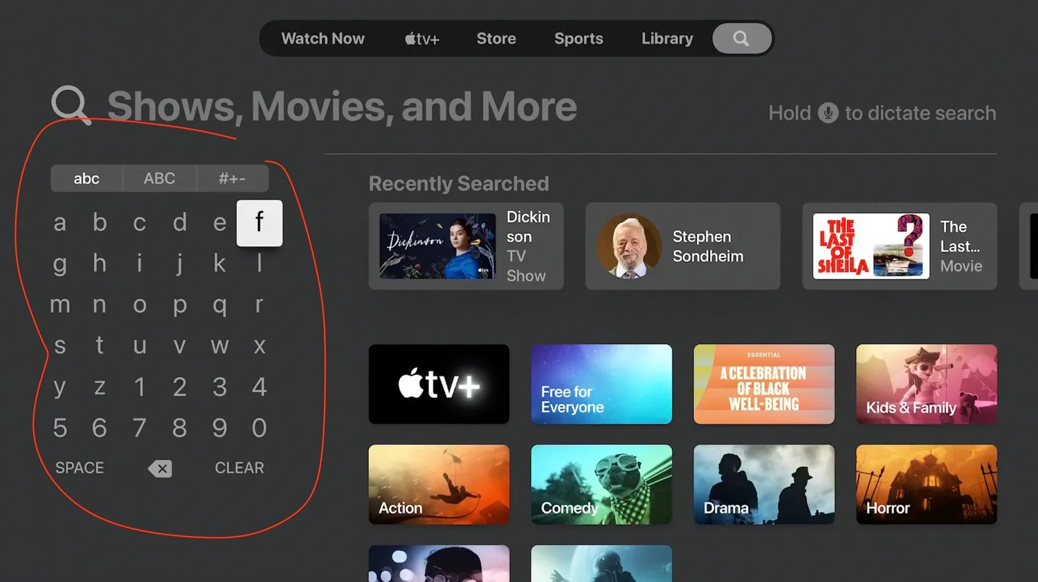 Apple TV search screen with the keyboard layout selection indicator highlighted