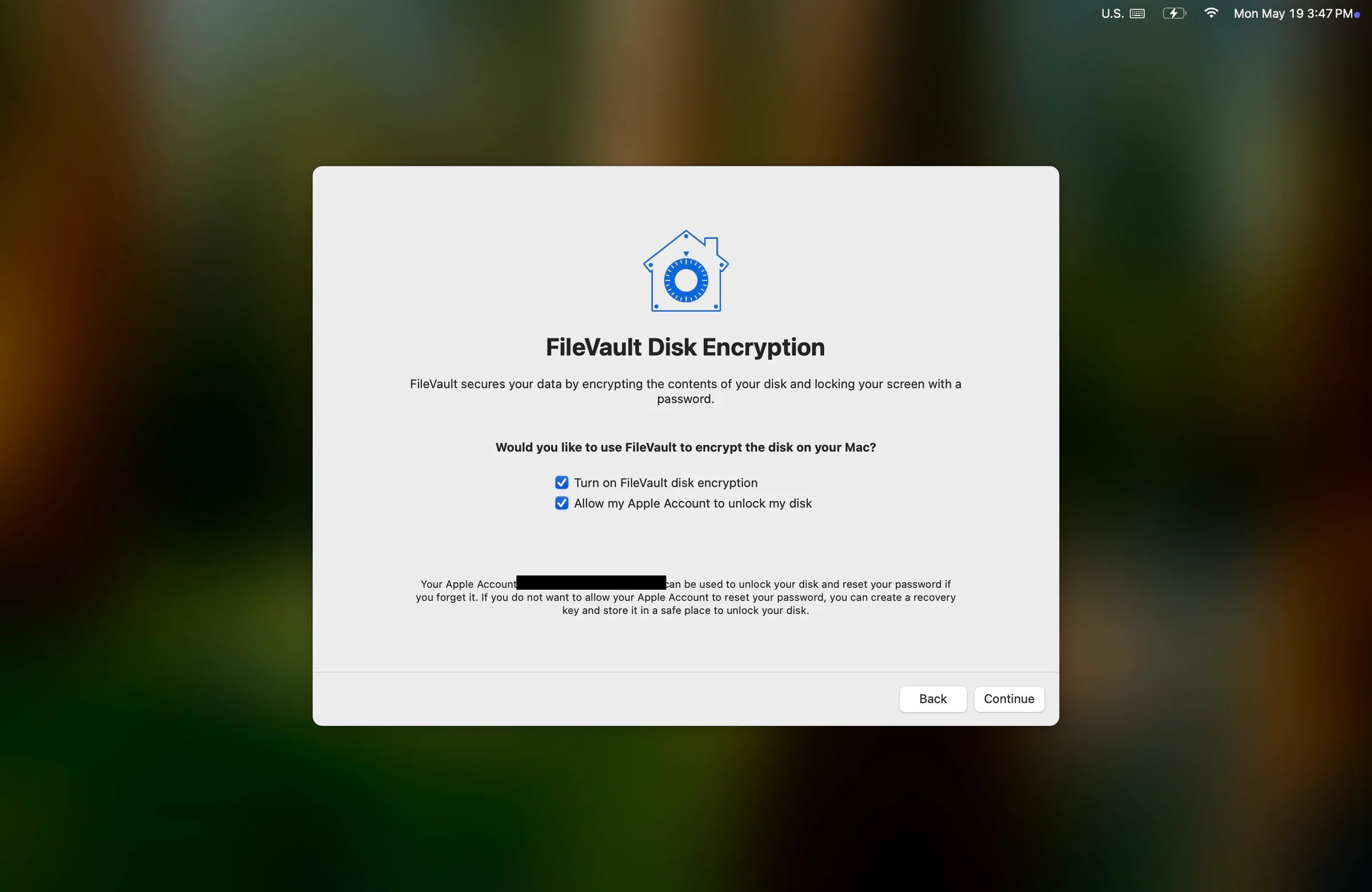 Screenshot of a Mac computer screen displaying the FileVault Disk Encryption settings, with options to turn on disk encryption and allow Apple account to unlock the disk.