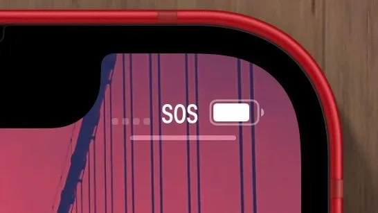 Close-up of SOS displayed in an iPhone status bar
