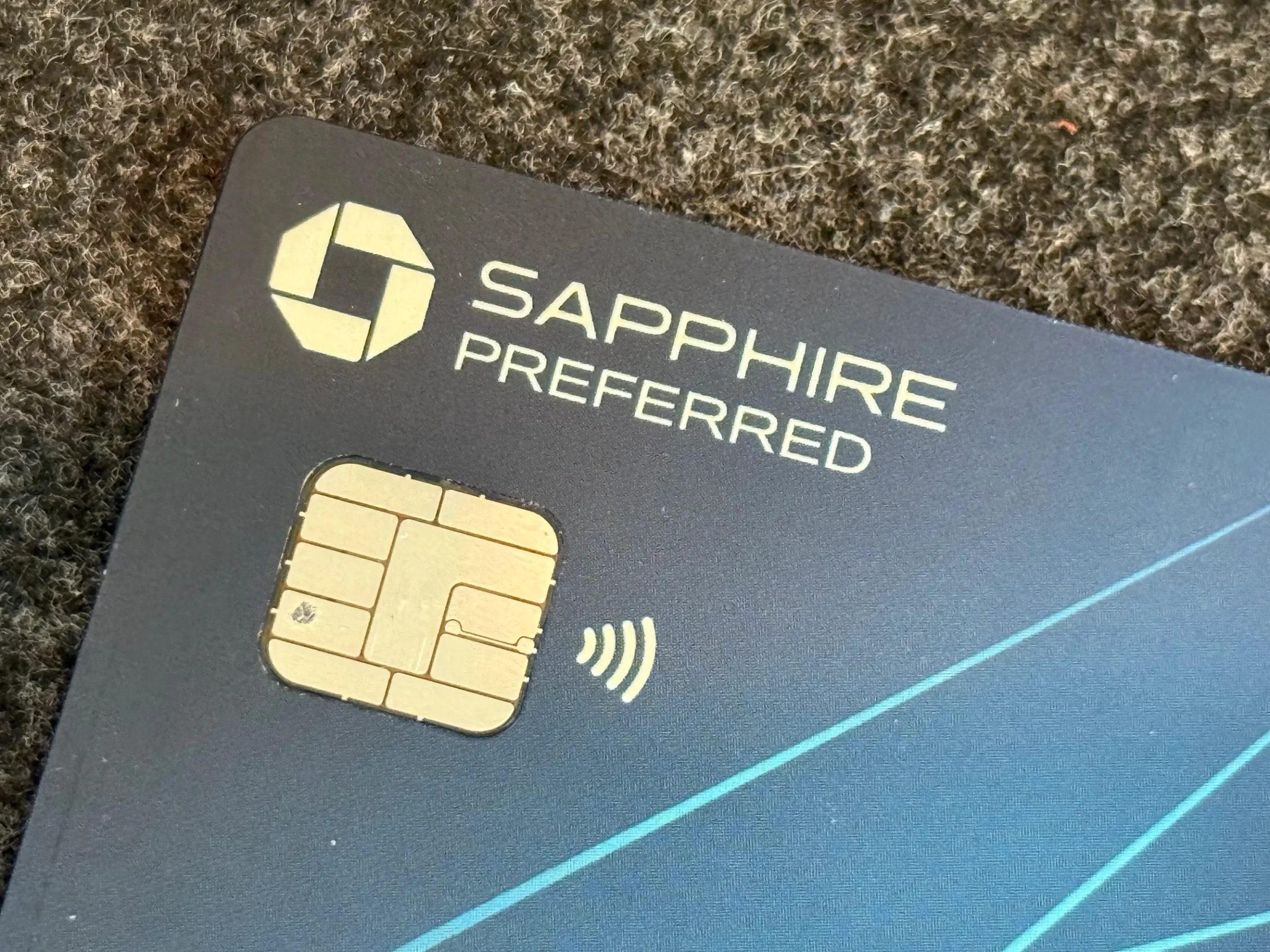 Credit card with the contactless payment symbol used to pay for a Metro ride