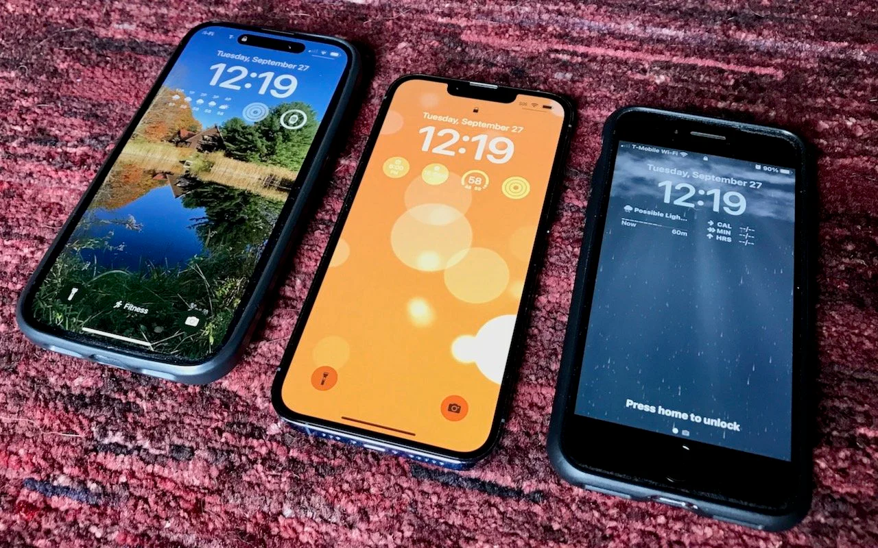 Three iPhones displaying different customized Lock Screens