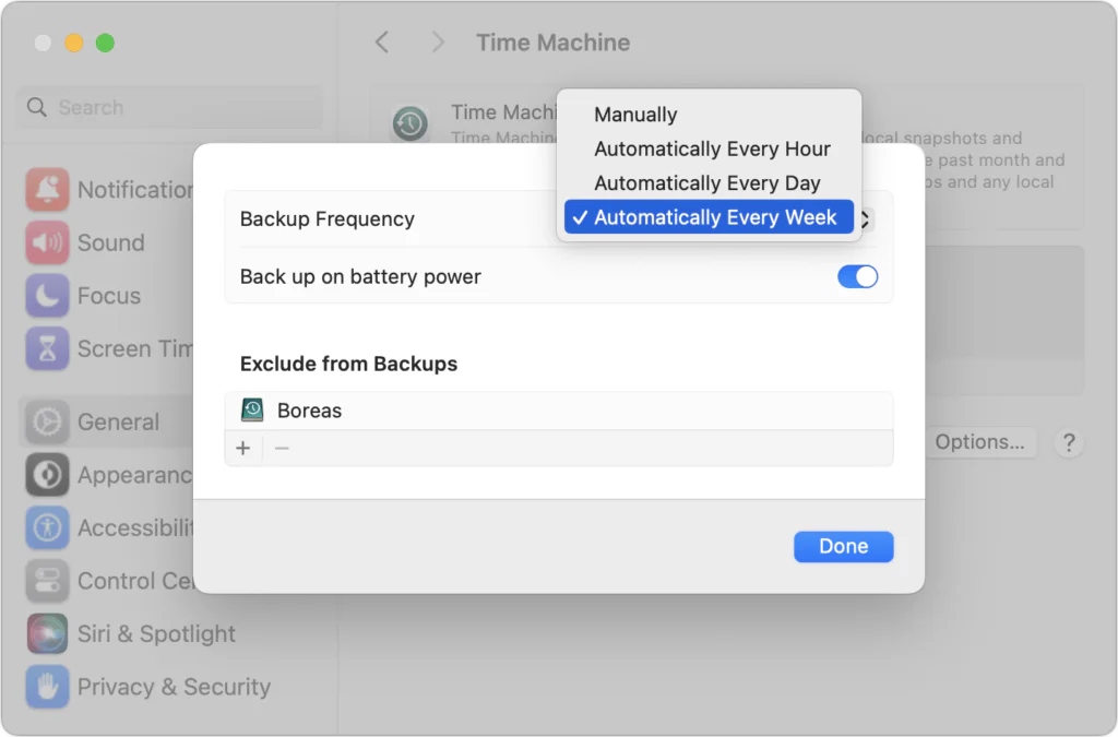 Mac Time Machine settings with the backup frequency menu open