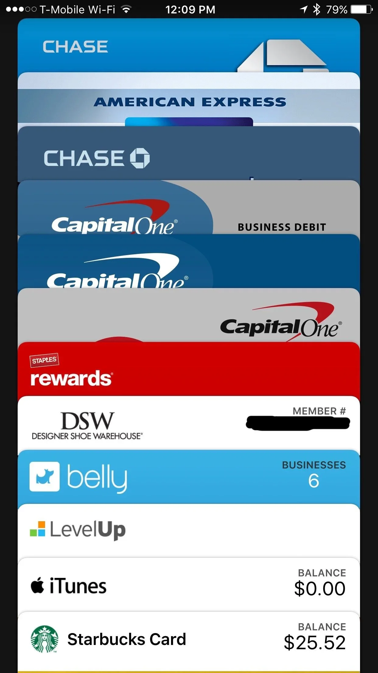 iPhone Wallet displaying a vertical stack of payment and rewards cards