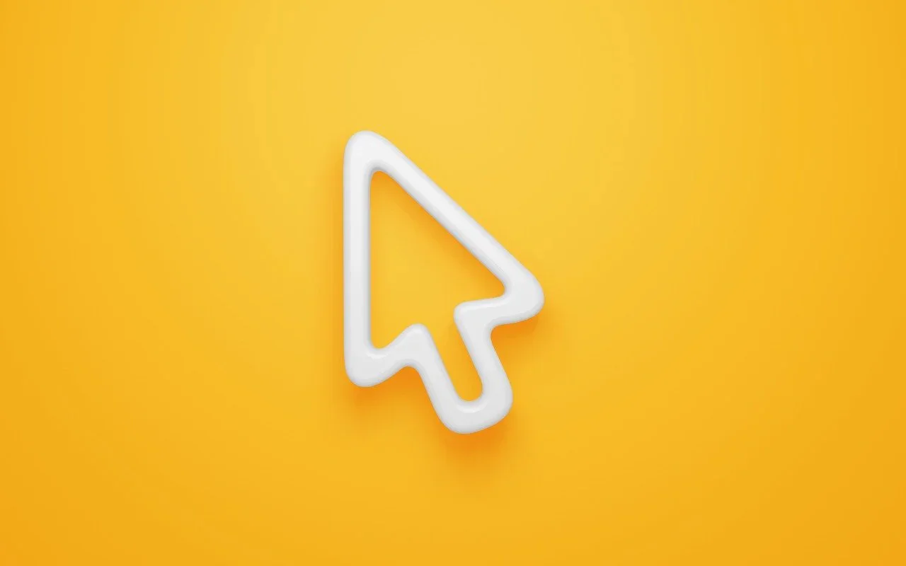 Large white mouse pointer on a yellow background