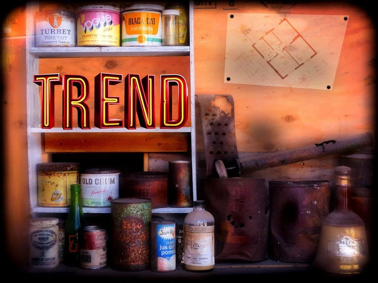 Vintage product packaging displayed around an illuminated Trend sign