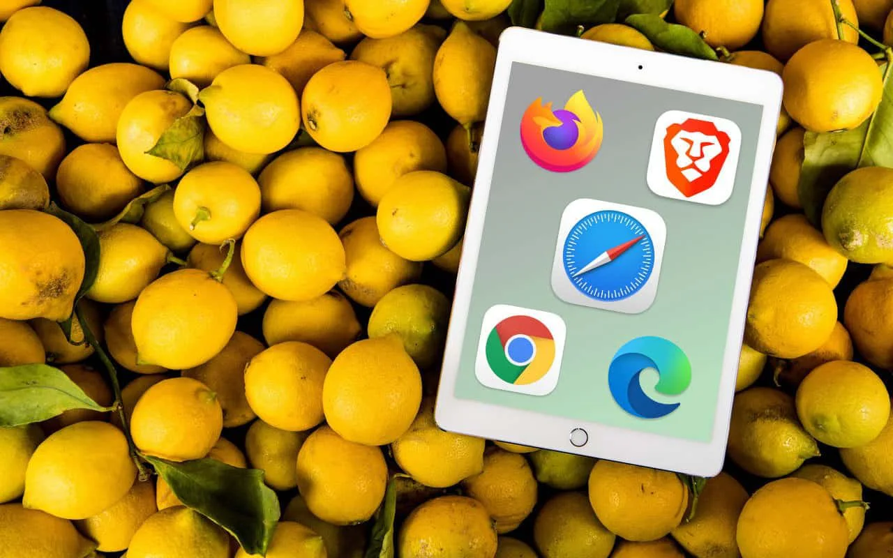 An iPad showing browser app icons while resting on a pile of lemons