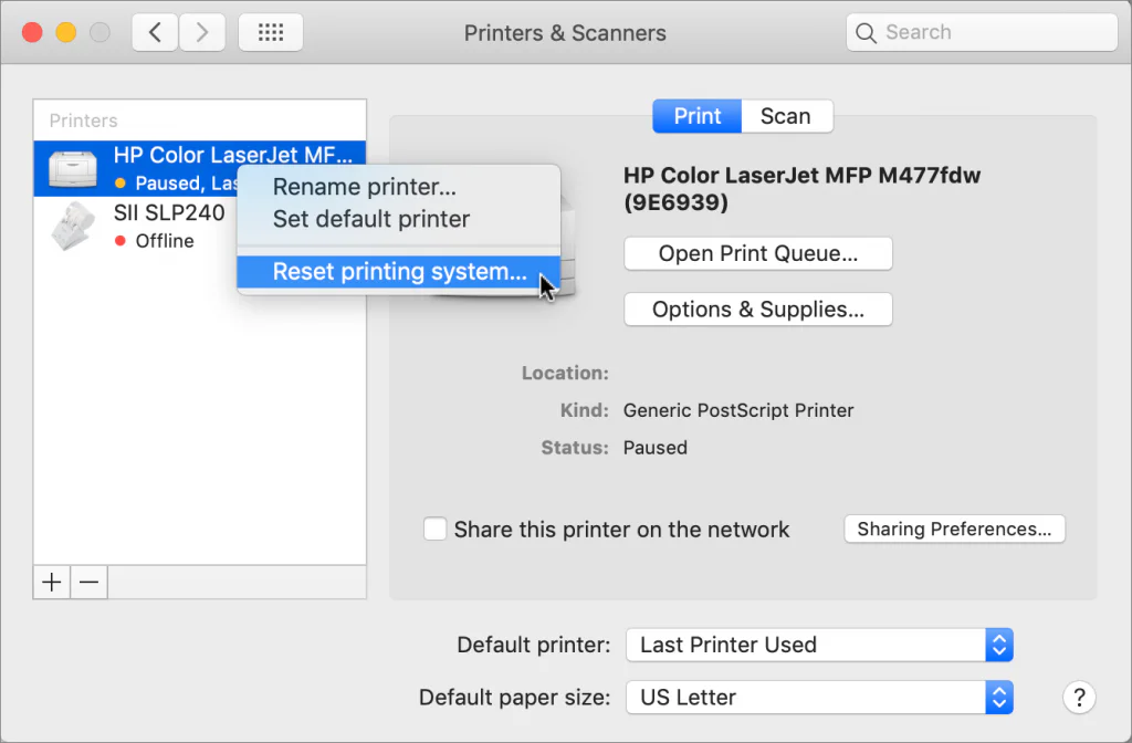 Mac Printers and Scanners menu with Reset printing system highlighted