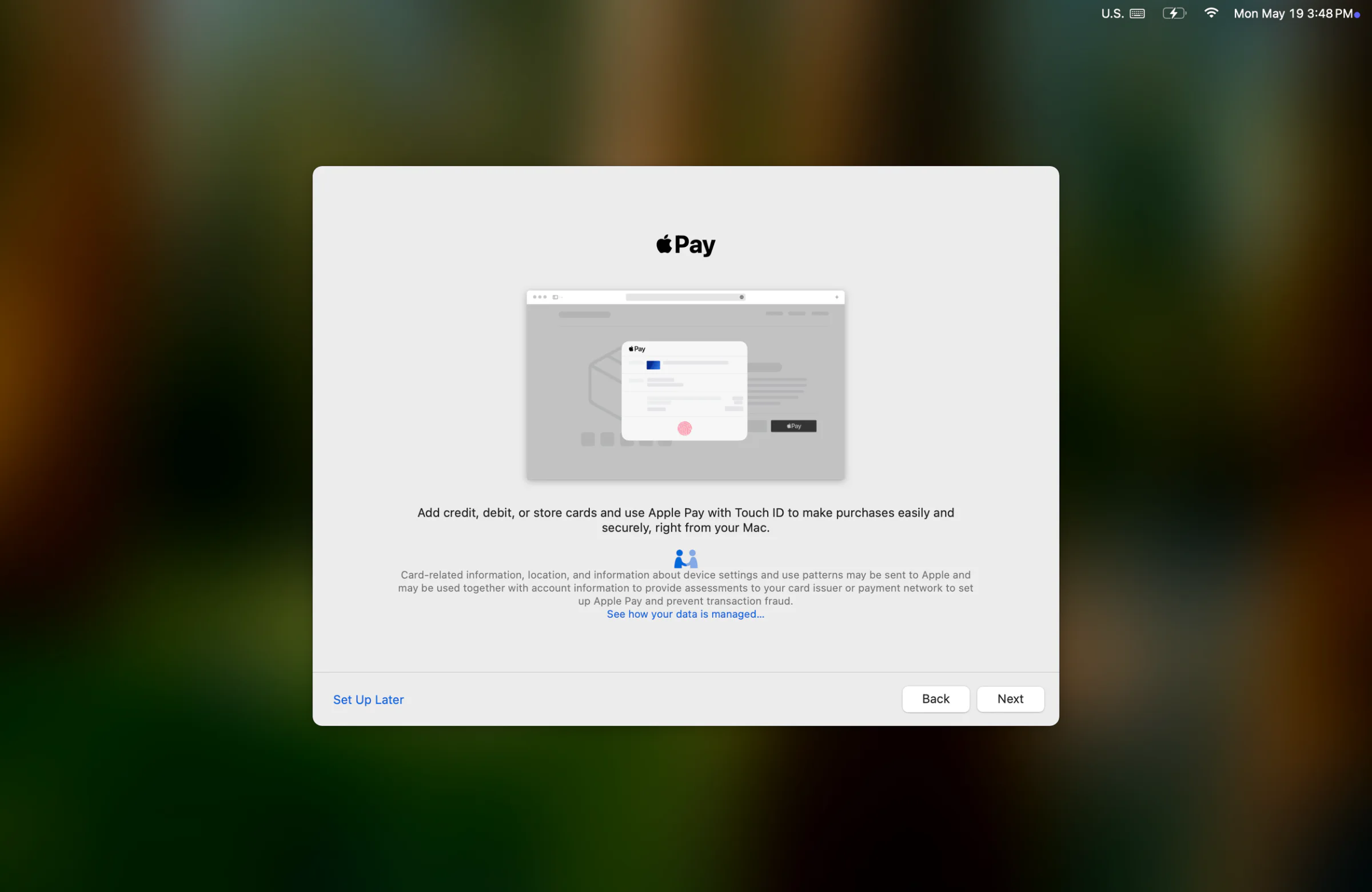 Apple Pay setup screen on a Mac, showing options to add credit or debit cards for contactless payments using Touch ID.