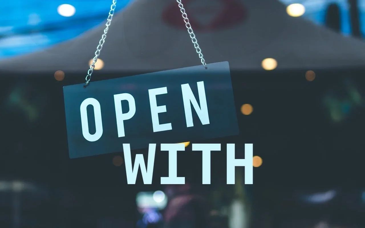 A hanging sign reading Open With