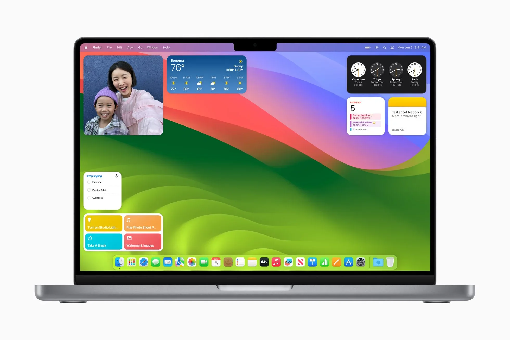 MacBook displaying macOS Sonoma widgets and video conferencing